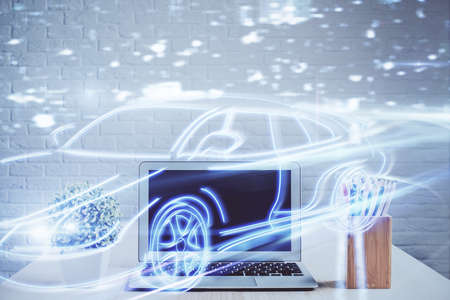 Desktop computer background in office with automobile hologram drawing. Multi exposure. Tech...