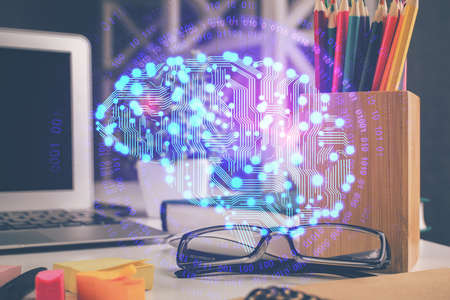 Brain drawings with glasses on the table background. Double exposure.の写真素材