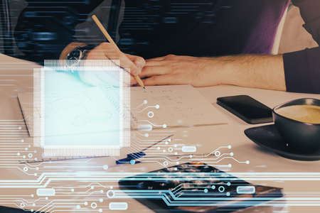 Mans hands with technology theme multi exposure icons. Concept of big data.