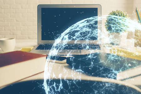 Computer on desktop with social network hologram. Multi exposure. Concept of international people...