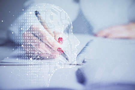 Double exposure of womans writing hand on background with brain hologram. Concept of brainstorming.