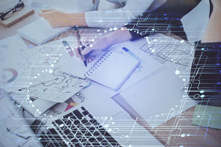 Double exposure of womans writing hand on background with data technology hud. Big data concept.