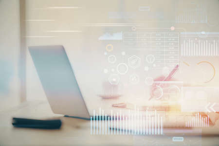 Businessman with computer background with technology theme hologram. Concept of hightech. Multi...