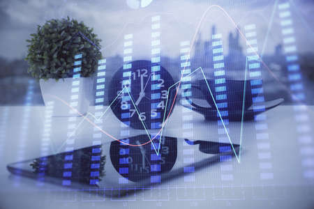 Double exposure of forex graph drawing and cell phone background. Concept of financial data analysis