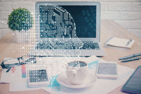 Double exposure of desktop with computer and brain drawing hologram. Artificial intelligence...