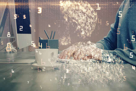 Technology theme hologram with man working on computer on background. High tech concept. Double...