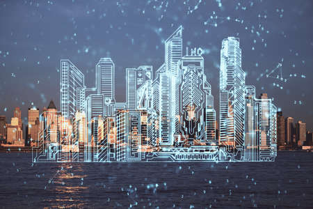 Double exposure of buildings hologram over cityscape background. Concept of smart city.の写真素材