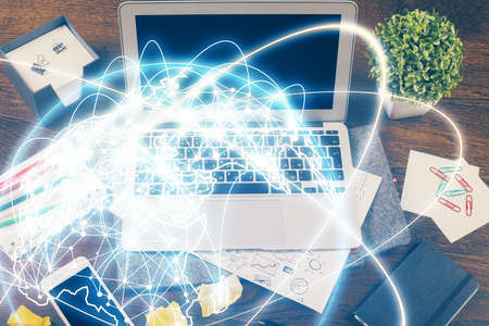 Multi exposure of business theme icons and work space with computer background. Concept of success.