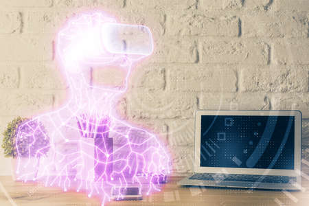 Computer on desktop with AR theme icon. Multi exposure. Concept of augmented reality.