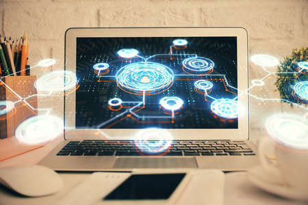Computer on desktop with social network hologram. Multi exposure. Concept of international people...
