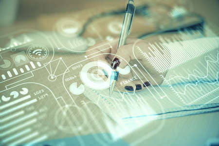 Technology theme hologram over womans hands taking notes background. Concept of Tech. Double...