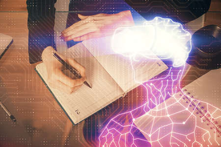 AR hologram over womans hands taking notes background. Concept of augmented reality. Multi exposure