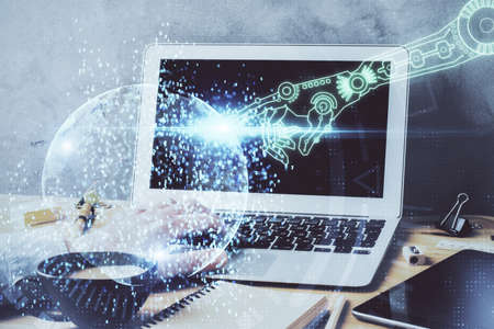 Double exposure of data internet theme hologram with man working on computer on background. Concept of innovation.の写真素材