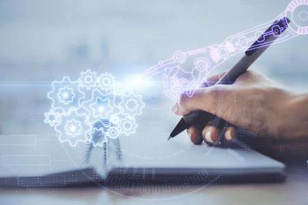 Double exposure of writing hands on background with data solution hologram on front. Technology...