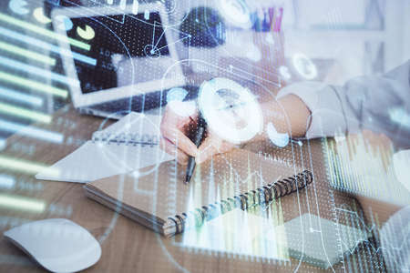Multi exposure of woman hands on background with technology coding hologram. Data concept.の写真素材