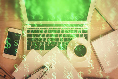 Stock market chart and top view computer on the table background. Double exposure. Concept of...