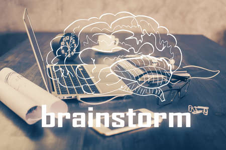 Desktop computer background in office and start up theme hologram drawing. Double exposure. Startup...