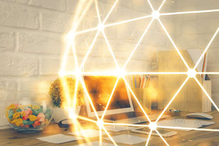 Computer on desktop with social network hologram. Multi exposure. Concept of international people connections.の写真素材