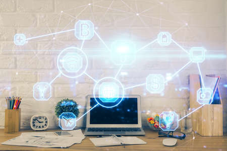 Computer on desktop with social network hologram. Multi exposure. Concept of international people...