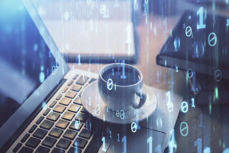 Double exposure of desktop computer and technology theme hologram. Concept of software development.