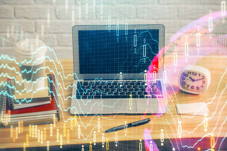 Multi exposure of forex graph and work space with computer. Concept of international online trading.の写真素材