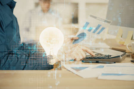 Growing arrows with businessman working on computer on background. Success concept. Double exposure.
