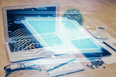 Double exposure of table with computer on background and data theme drawing. Concept of innovation.