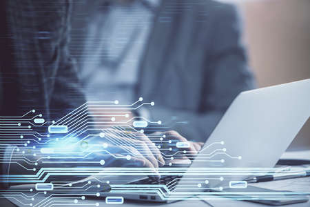 Businessman with computer background with technology theme hologram. Concept of big data. Double...