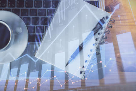 Multi exposure of forex chart drawing and work table top veiw. Concept of financial analysis.