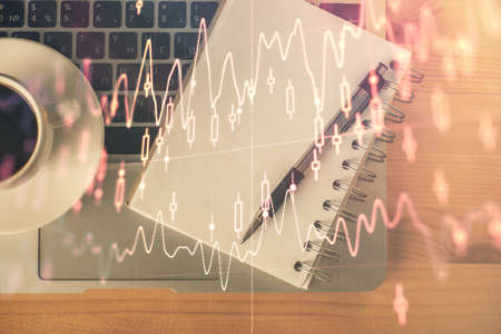 Multi exposure of forex chart drawing and work table top veiw. Concept of financial analysis.の写真素材