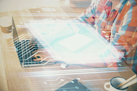 Businessman with computer background with technology theme hologram. Concept of big data. Double exposure.の写真素材