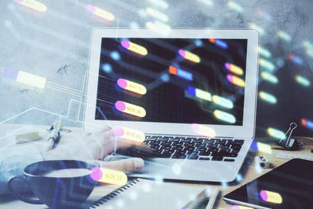 Double exposure of data internet theme hologram with man working on computer on background. Concept of innovation.の写真素材