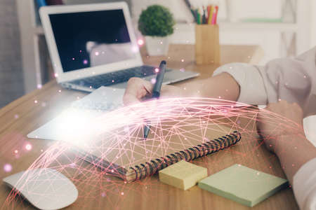 Social network theme hologram over womans hands writing background. Concept of international people...