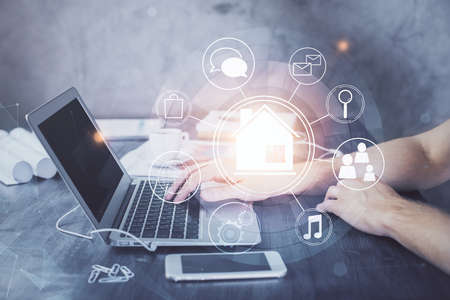 High tech city drawing with businessman working on computer on background. Smartcity concept. Double...