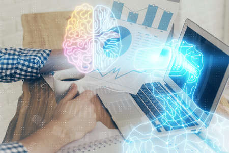 AR hologram with man working on computer on background. Augmented reality concept. Double exposure.