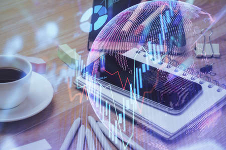 Double exposure of forex chart drawing and cell phone background. Concept of financial trading