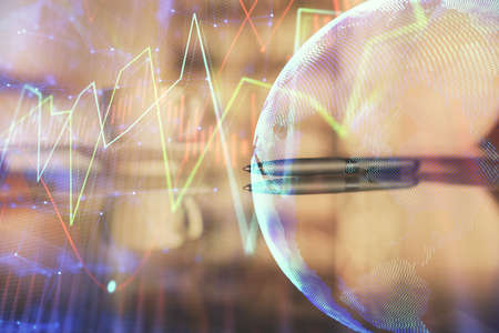 Double exposure of forex chart over coffee cup background in office. Concept of financial analysis and success.の写真素材