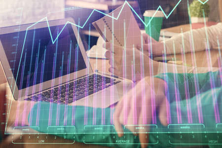 Double exposure of man and woman working together and forex chart hologram. Business concept....