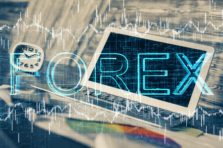 Multi exposure of chart and financial info and work space with computer background. Concept of international online trading.の写真素材