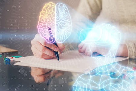 AR hologram over hands taking notes background. Concept of augmented reality. Double exposure