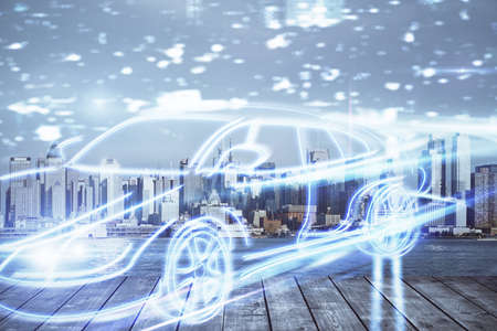 Double exposure of transport theme hologram drawing and city view background. Concept autopilot.
