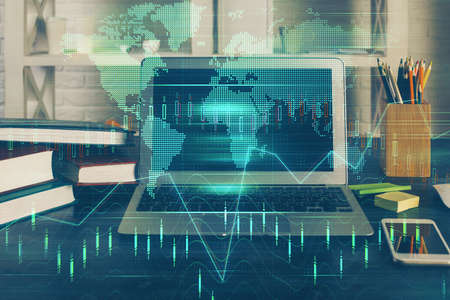 Double exposure of forex graph and work space with computer. Concept of international online...