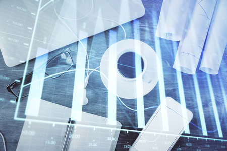 Multi exposure of forex graph drawing over desktop background with computer. Concept of financial analysis. Top view.の写真素材
