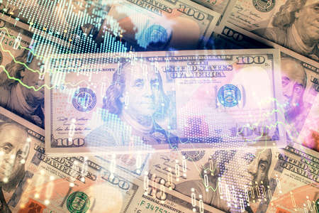 Multi exposure of forex chart drawing over us dollars bill background. Concept of financial success...