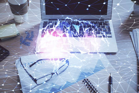 Double exposure of desktop computer and human brain drawing hologram. Ai concept.