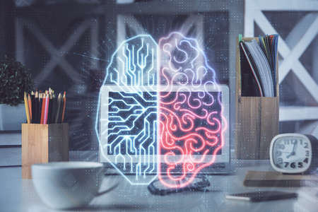 Double exposure of work space with computer and human brain drawing hologram. Brainstorm concept.