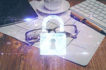 Lock drawings with glasses on the table background. concept of security. Double exposure.