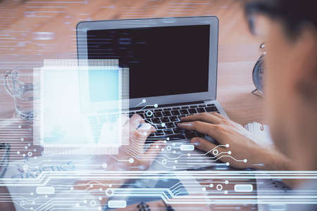 Businessman with computer background with technology theme hologram. Concept of big data. Double...