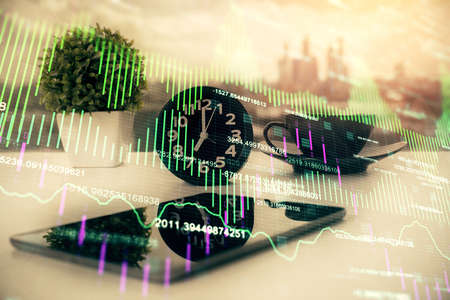 Double exposure of forex graph drawing and cell phone background. Concept of financial data analysisの写真素材