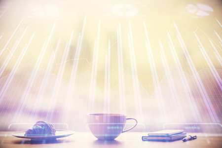Double exposure of forex chart over coffee cup background in office. Concept of financial analysis...